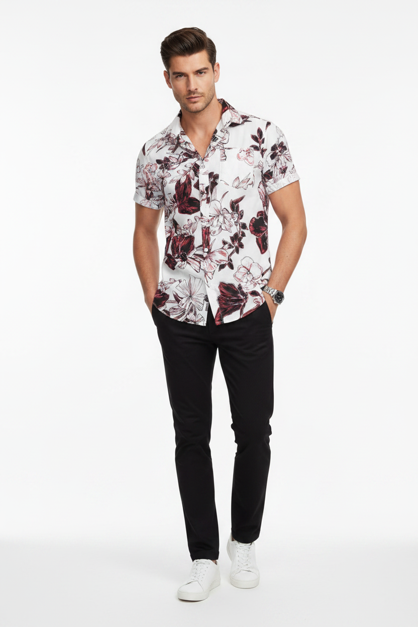 Man in MNG white slim shirt with burgundy floral print and black trousers