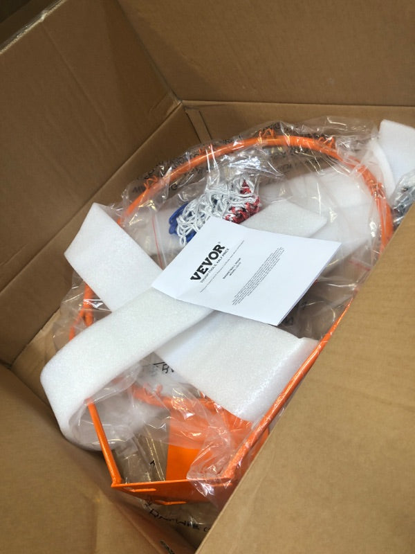 VEVOR basketball rim packed in opened cardboard box