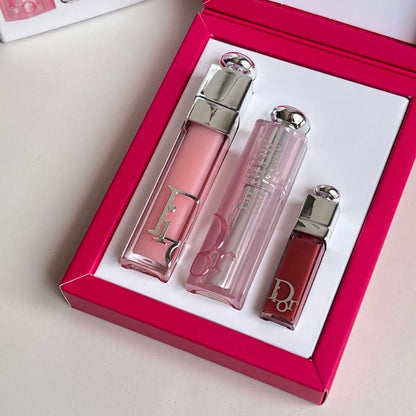 Close-up of Dior Lip Maximizer and Lip Glow in red gift box
