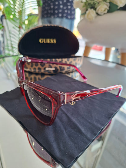 Guess red cat-eye sunglasses with leopard print case and cloth