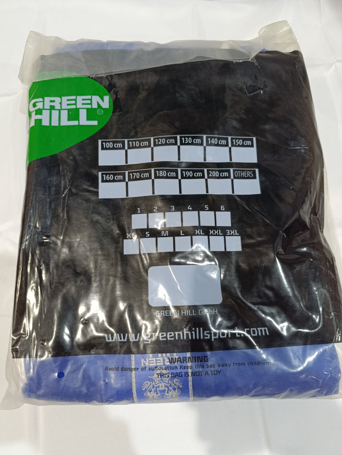 Green Hill judo gi in sealed bag with label, back of pack