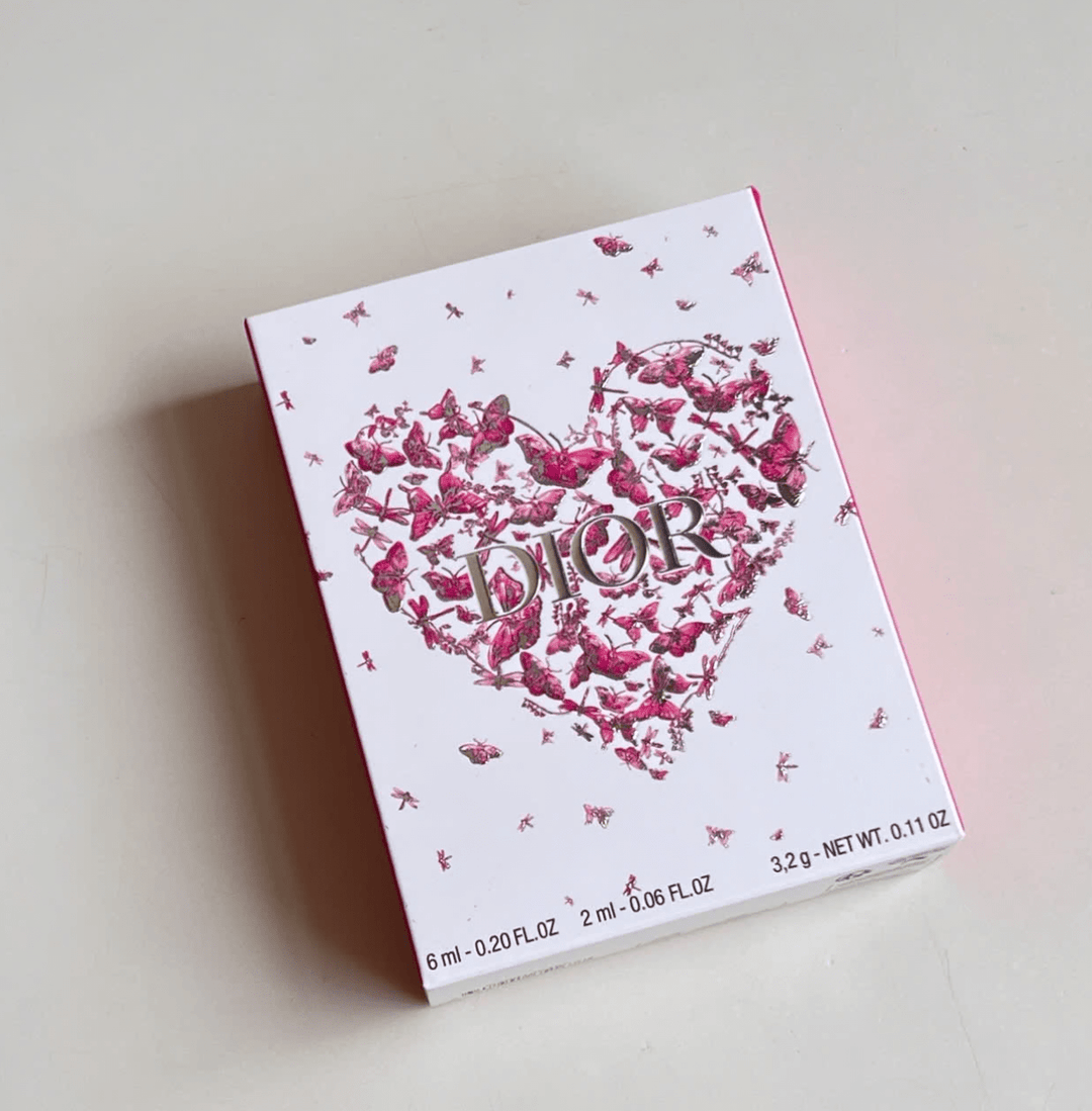 Dior gift box lid with pink heart design