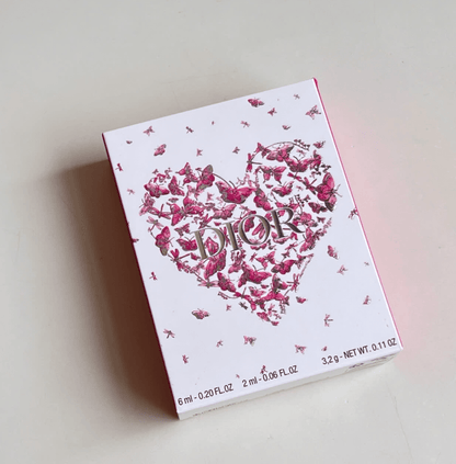 Dior gift box lid with pink heart design