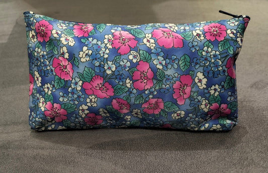 Zippered Blue Cosmetic Pouch With Floral Patterns