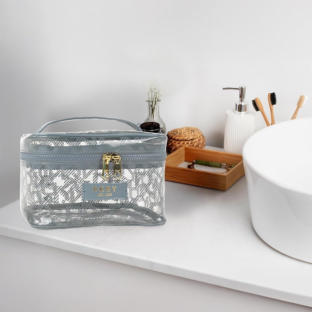 DKNY Lucid Dream grey traincase on bathroom counter