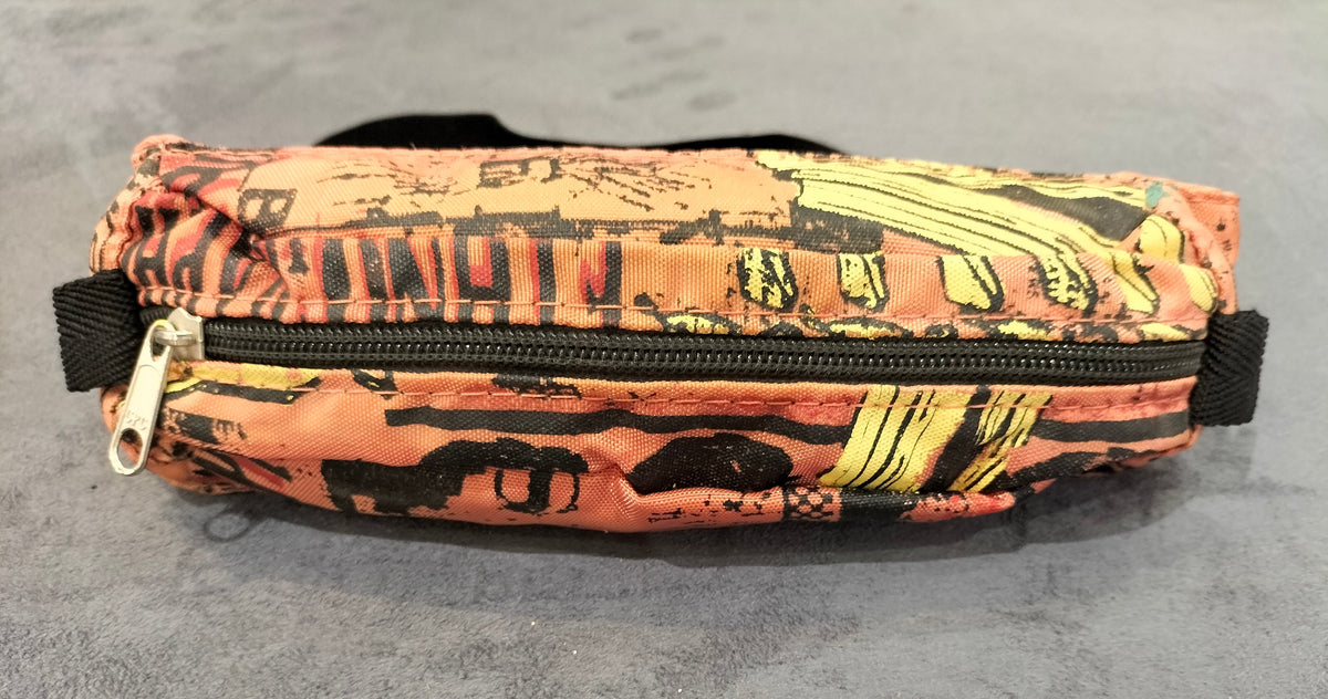 Orange Waist Pack With Black And Yellow Patterns