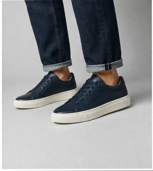 Man wearing Massimo Dutti navy leather shoes with rolled jeans