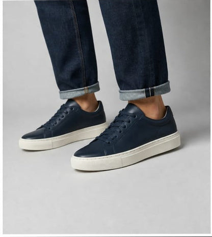 Man wearing Massimo Dutti navy leather shoes with rolled jeans