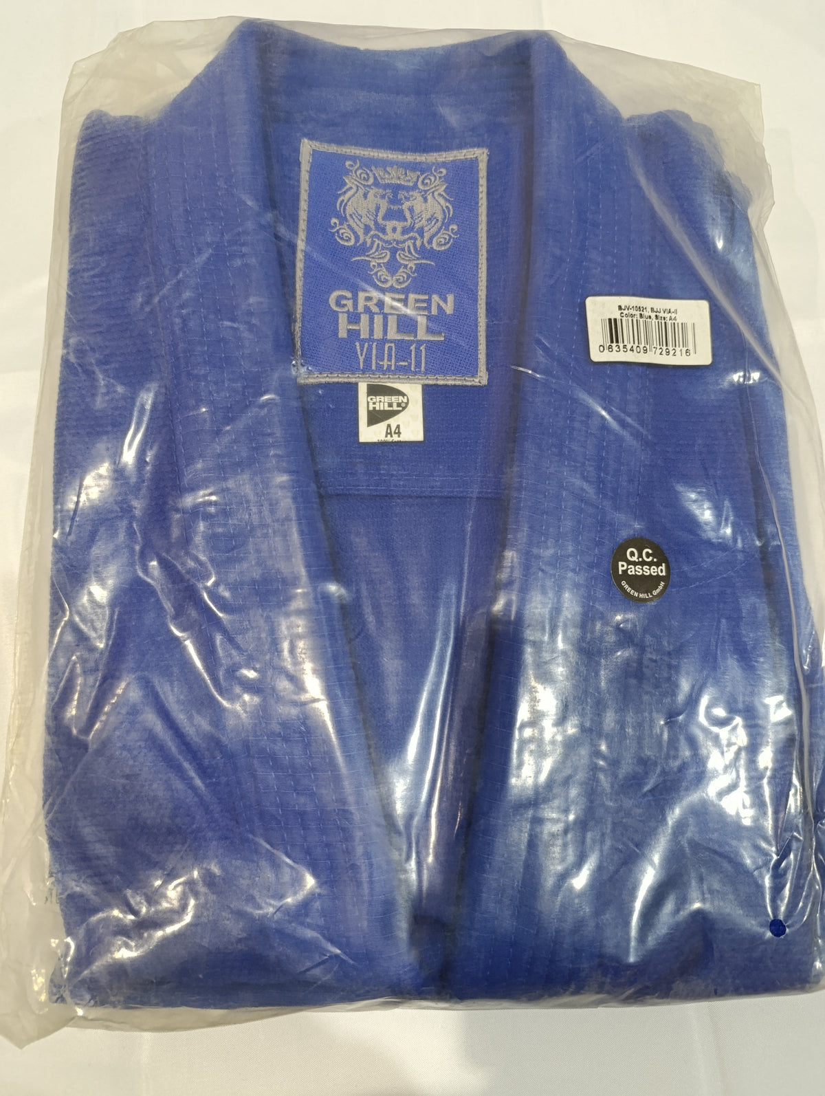 Green Hill blue judo gi folded in clear bag