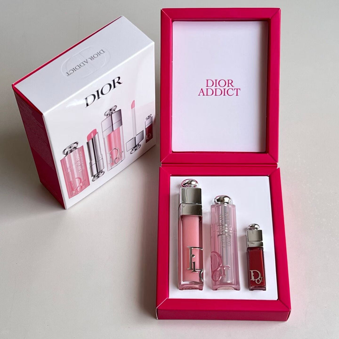 Dior Addict gift set opened showing lip gloss, balm and mini
