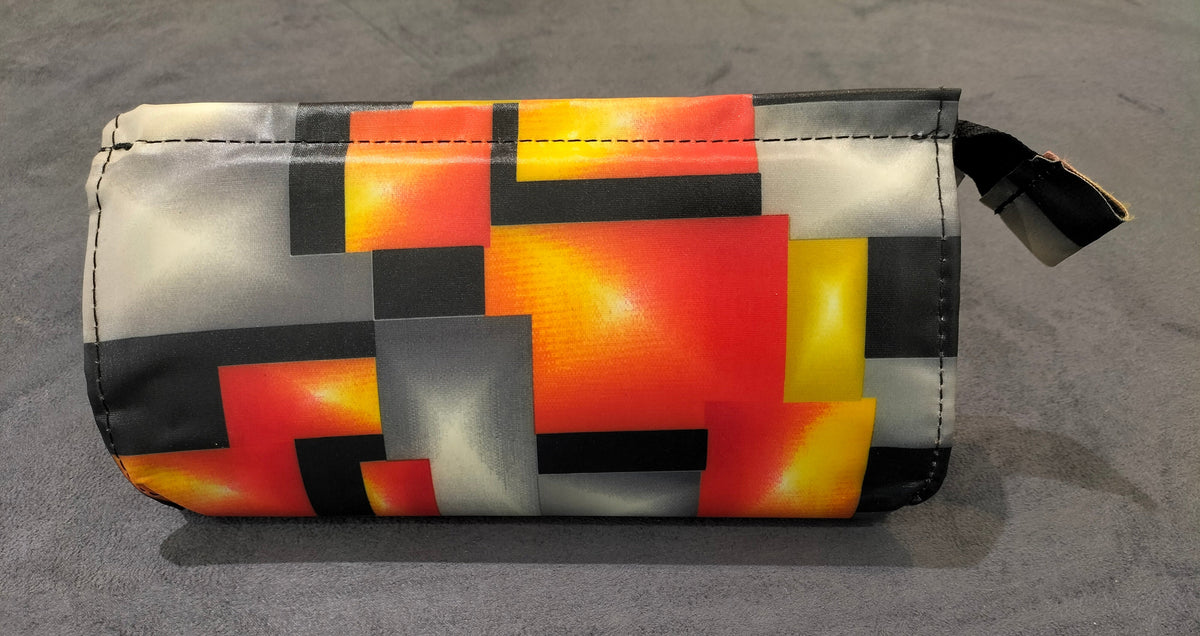 Zippered Cosmetic Pouch With Grey And Orange Block Pattern