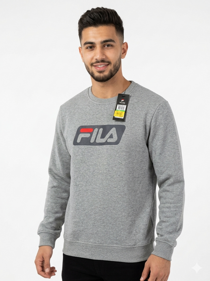Man in Fila grey logo sweatshirt with tag