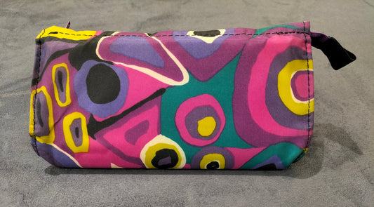 Zippered Cosmetic Pouch With Vibrant Abstract Patterns