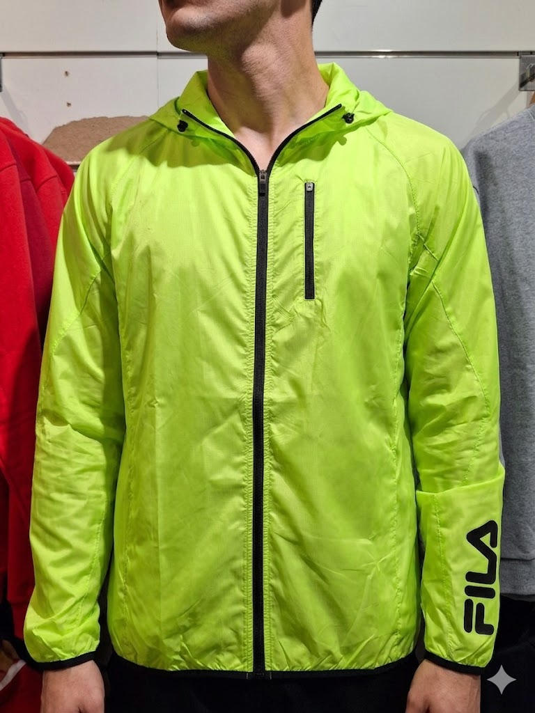 Man wearing Fila neon lime zip windbreaker