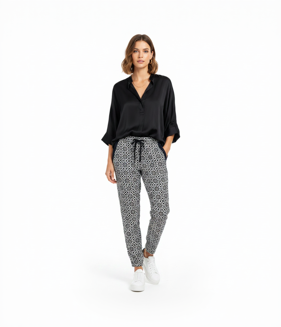 Front view of a woman wearing G-Star Raw Bronson Mid Sport Chino in geometric pattern with drawstring waist.
