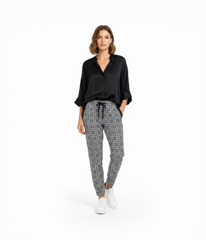 Front view of a woman wearing G-Star Raw Bronson Mid Sport Chino in geometric pattern with drawstring waist.