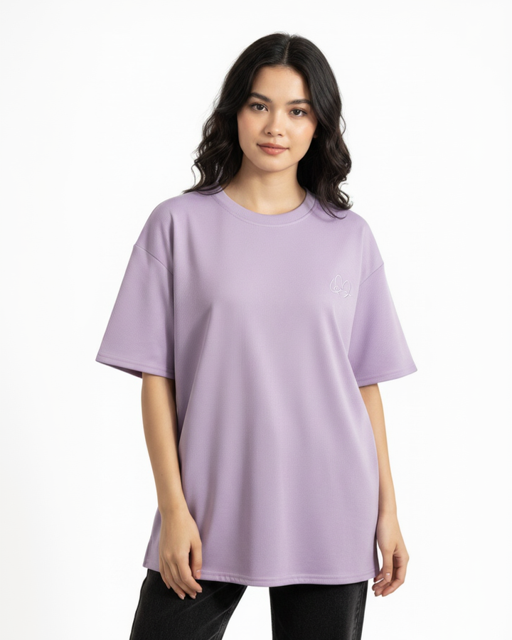 Woman wearing lavender tee