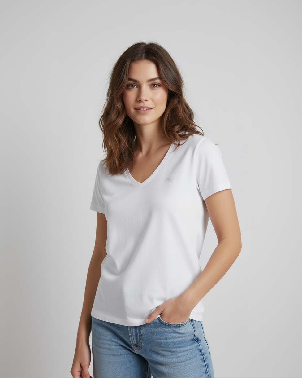Woman wearing white v-neck tee
